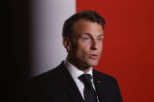 Macron hosts decoration ceremony for restorer of Notre-Dame Cathedral