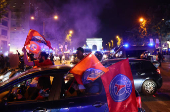 Champions League - Fans celebrate after Paris St Germain qualifies for the final