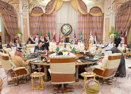 FILE PHOTO: U.S. President Donald Trump sits down to a meeting with of Gulf Cooperation Council leaders, including Saudi Arabia's King Salman bin Abdulaziz Al Saud, during their summit in Riyadh
