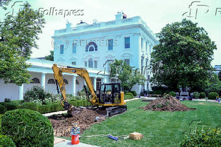 View shows machinery in the Rose Garden at the White House, in Washington