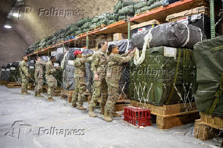 FILE PHOTO: U.S. Air Force members work on the preparation of a humanitarian aid drop for Gaza residents
