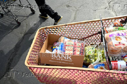 Food pantry is busy, weeks into the continuing U.S. government shutdown, in Commerce City