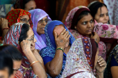 Relatives react after the body of Yatish Parmar, who was killed in a suspected militant attack near Pahalgam in south Kashmir, was brought to his home in Bhavnagar