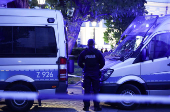 Polish police secure an earea at the Warsaw University after an attack with an axe