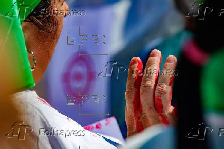 Health unions and workers protest use of aid withholding as weapon of war in Brussels