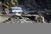 Several people dead in Pakistan-administered Kashmir following storms and landslides