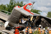Aftermath of bridge collapse and train derailment in Russia's Bryansk region