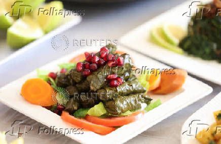 Stuffed grape leaves are placed on a table at Zainab Khalifeh's restaurant, a Lebanese who turned a part of her home into a restaurant and called it 'Zainab's table' in the town of Sarafand