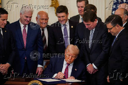 U.S. President Trump participates in a signing ceremony for the 