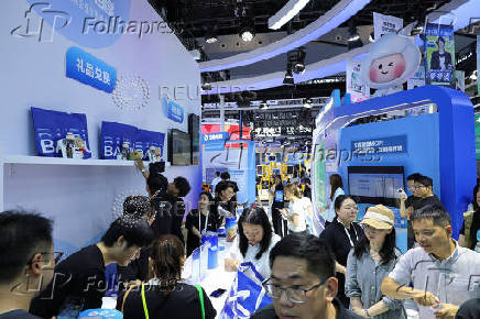 People visit Baidu booth during WAIC in Shanghai