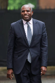 Britain's Foreign Secretary David Lammy walks on Downing Street in London