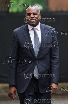 Britain's Foreign Secretary David Lammy walks on Downing Street in London
