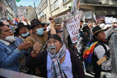 Supporters of Evo Morales's candidacy clash with police, in La Paz