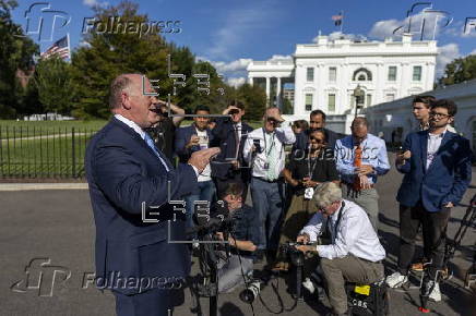 US Border Czar Tom Homan talks with news media outside the West Wing