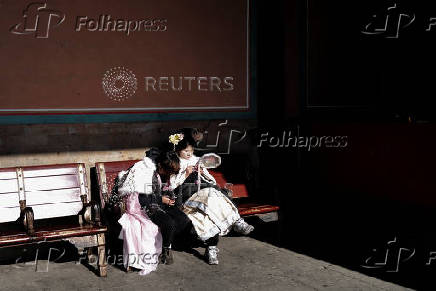 Tourists visit the Forbidden City in Beijing