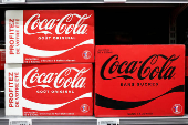 Cans of Coca-Cola at a supermarket in Perros-Guirec