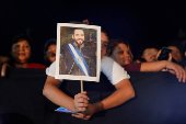 El Salvador's President Nayib Bukele delivers a speech to mark the first year of his second term in office, in San Salvador