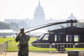 Helicopters and other heavy equipment staged for DC military parade