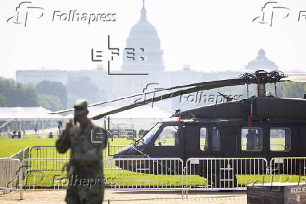 Helicopters and other heavy equipment staged for DC military parade