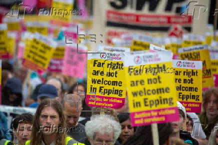 Protest against far-right campaigners targeting migrants in Epping