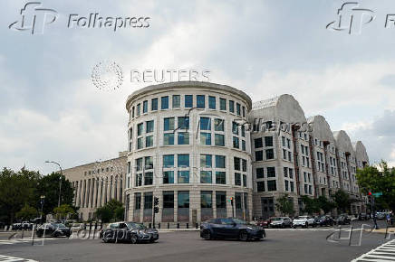Vehicles drive past the E. Barrett Prettyman U.S. Courthouse in Washington, D.C.