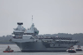 Britain's HMS Prince of Wales aircraft carrier arrives at Marina Bay Cruise Centre in Singapore