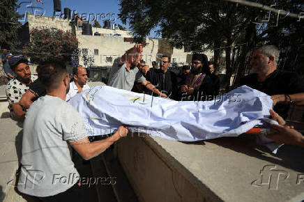 Aftermath of an Israeli strike on the Church of the Holy Family, in Gaza City