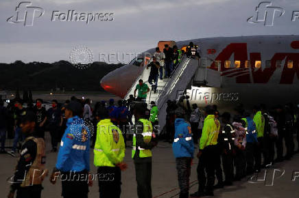 Venezuelans migrants detained in El Salvador arrive to Venezuela