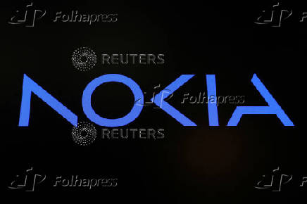 FILE PHOTO: A screen displays the company logo for Nokia Corporation on the floor of the NYSE in New York