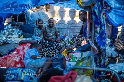 Migrants camp outside Paris City Hall asking for shelter