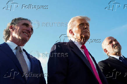 U.S. President Donald Trump speaks to members of the media upon his arrival from Pennsylvania, at Joint Base Andrews
