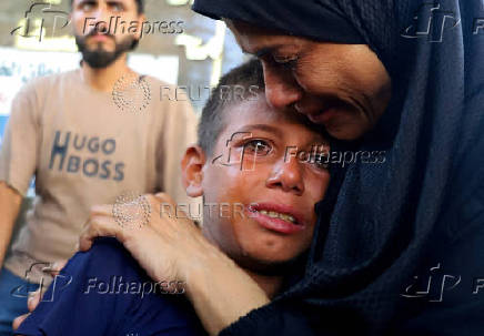 Funeral of Palestinians killed in Israeli fire while seeking aid on Wednesday, in Gaza City