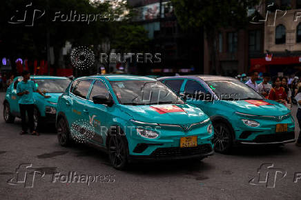 VinFast electric taxis wait for customers in Hanoi