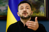 FILE PHOTO: Ukraine's President Zelenskiy speaks during a press briefing, in Kyiv