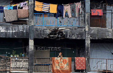 Displaced Palestinians shelter in a UNRWA school, in Khan Younis