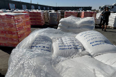 Supplies wait to be loaded on trucks to go into the Gaza Strip, at the Kerem Shalom crossing between Israel and Gaza