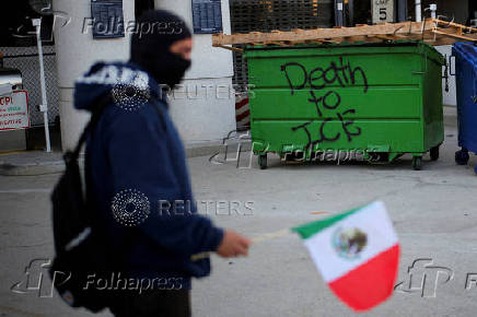 FILE PHOTO: Protesters gather around the Los Angeles Federal Building after multiple detentions by ICE, in Los Angeles