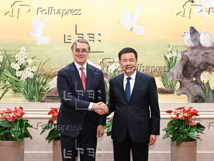 Chinese public security chief Wang Xiaohong meets U.S. Ambassador Perdue in Beijing