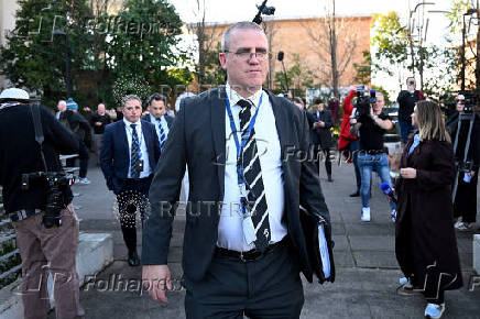 Detective Leading Senior Constable Stephen Eppingstall leaves the Latrobe Valley Magistrates' Court in Morwell