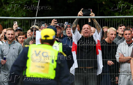 Protests outside a hotel used for housing asylum seekers, in Epping