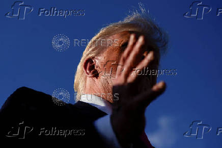 U.S. President Donald Trump speaks to members of the media upon his arrival from Pennsylvania, at Joint Base Andrews