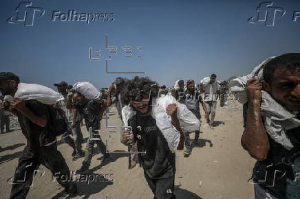 Aid enters Gaza Strip after Israel announces daily pause of hostilities