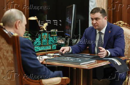 Russian President Putin meets Omsk Region Governor Khotsenko in Moscow