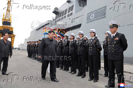 North Korean leader Kim Jong Un visits a Choe Hyon-class destroyer