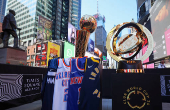 2025 NBA Champion Larry O'Brien Trophy and FIFA Club World Cup 2025 winners trophy are displayed in Times Square in New York City