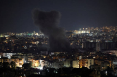Israeli strike on Beirut's southern suburbs, after the Israeli military issued an evacuation warning for the area, as seen from Baabda