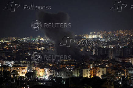 Israeli strike on Beirut's southern suburbs, after the Israeli military issued an evacuation warning for the area, as seen from Baabda