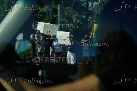 Protest against federal immigration sweeps, in Downey