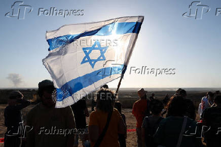 Israeli right wing activists take part in a rally organized by settlers groups to promote Israel's resettling in Gaza