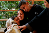 Palestinians mourn loved ones killed in Israeli strikes